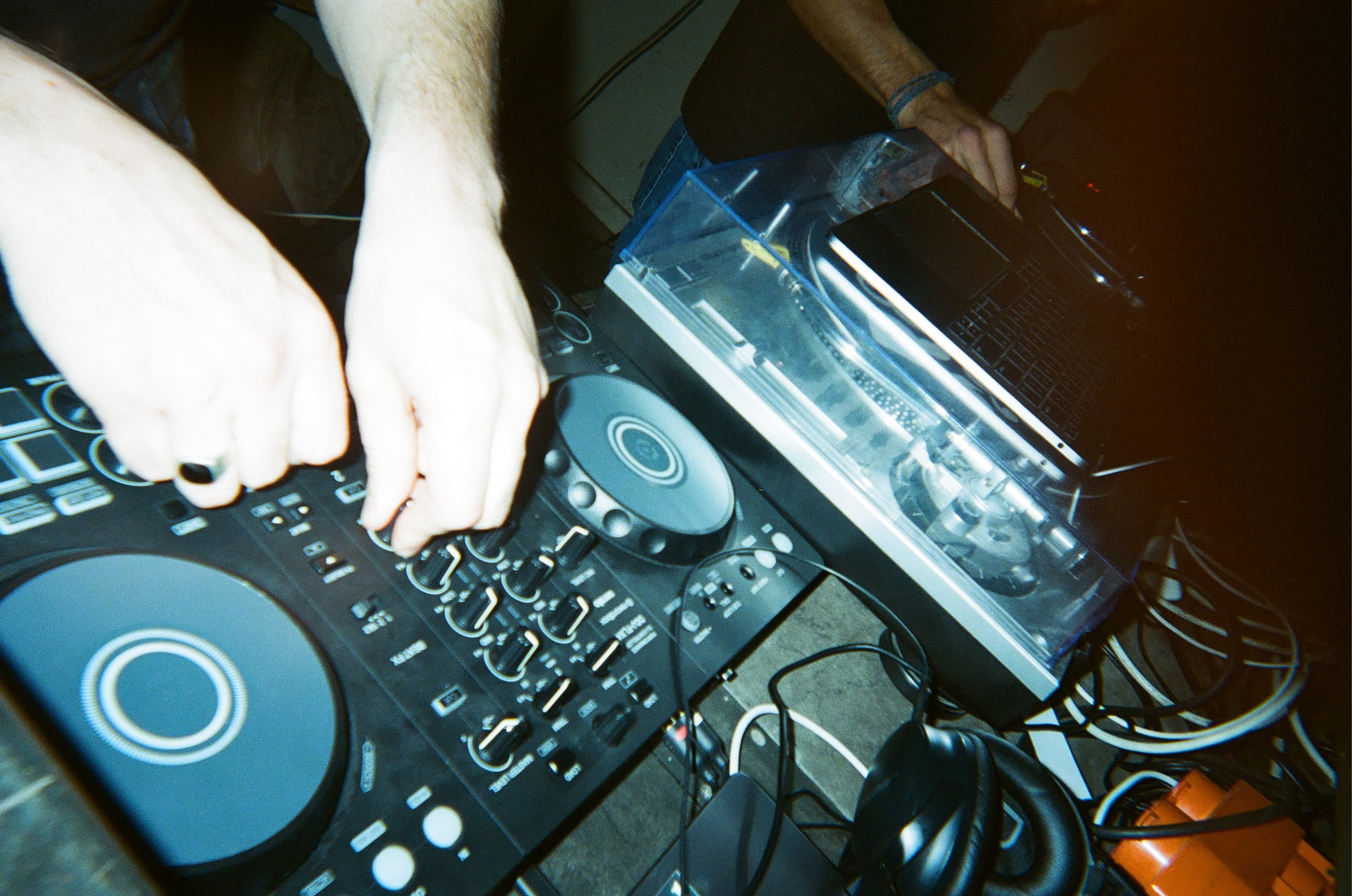 Image of a DJ set playing at a party for the Awwwards Conference