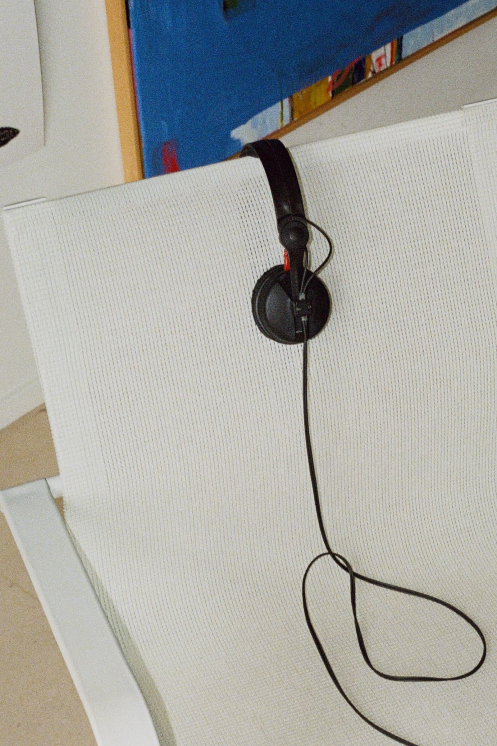 Image of a headphone set on a chair at the Antinomy Studio office in Amsterdam
